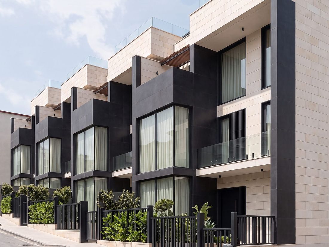 Sky Villas street elevation in daylight — dark panels and stone, Bagebi, Vake, Tbilisi