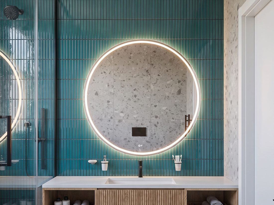 Bathroom in teal tile with a backlit round mirror, Sky Villas